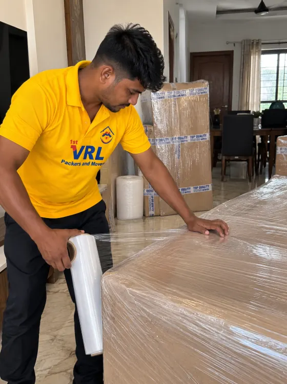 Furniture wrapped in stretch film before loading